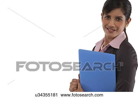 Stock Image - Portrait of a businesswoman with a file . Fotosearch