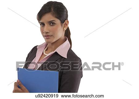 Portrait of a businesswoman with a file View Large Photo Image Stock Photo - Portrait of a businesswoman with a file . Fotosearch