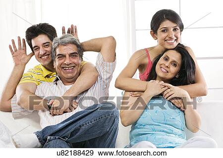Stock Photo - Portrait of a family . Fotosearch