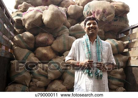 Stock Image - Portrait of a food merchant . Fotosearch