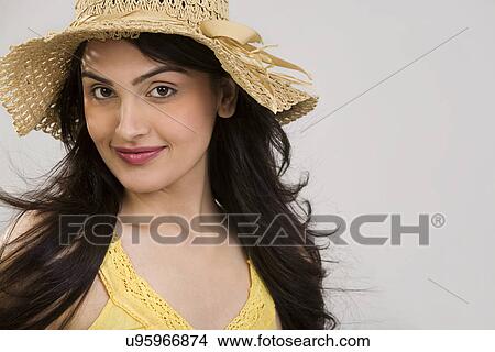 Picture - Portrait of a girl in a hat . Fotosearch