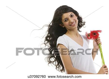 Portrait of a girl with flowers  View Large Photo Image Stock Image - Portrait of a girl with flowers . Fotosearch