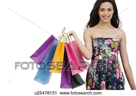 Portrait of a girl with shopping bags View Large Photo Image Stock Image - Portrait of a girl with shopping bags . Fotosearch