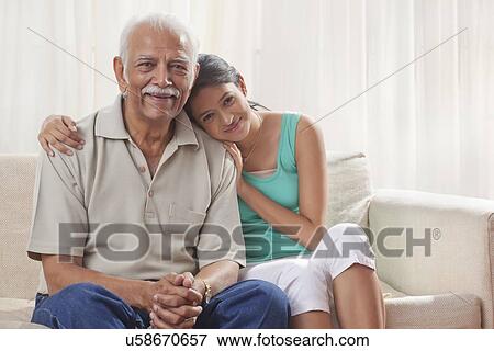 Portrait of a grandfather and granddaughter View Large Photo Image Stock Photo - Portrait of a grandfather and granddaughter. Fotosearch