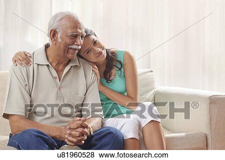 Portrait of a grandfather and granddaughter View Large Photo Image Stock Photo - Portrait of a grandfather and granddaughter. Fotosearch