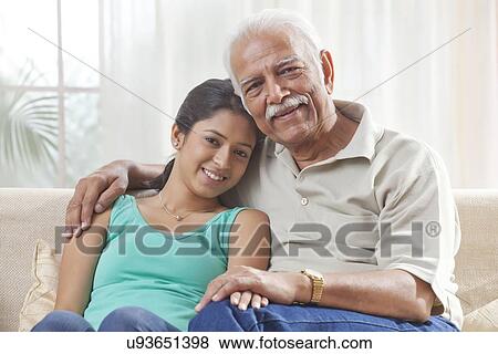 Portrait of a grandfather and granddaughter View Large Photo Image Stock Photo - Portrait of a grandfather and granddaughter. Fotosearch
