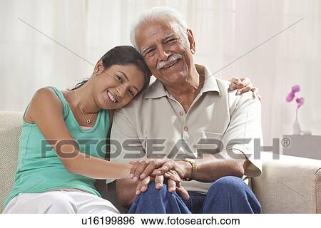 Stock Photograph - Portrait of a grandfather and granddaughter. Fotosearch