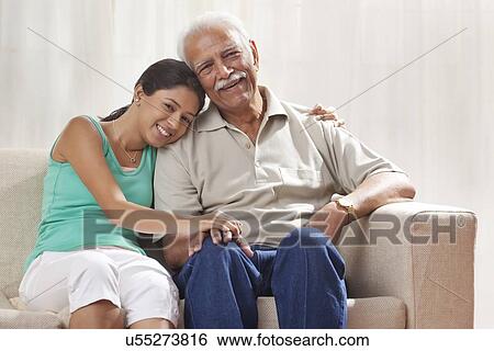 Portrait of a grandfather and granddaughter View Large Photo Image Stock Photograph - Portrait of a grandfather and granddaughter. Fotosearch
