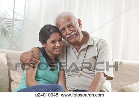 Stock Photography - Portrait of a grandfather and granddaughter. Fotosearch