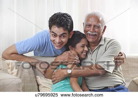 Stock Photography - Portrait of a grandfather and grandchildren. Fotosearch