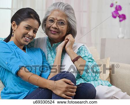 Portrait of a grandmother and granddaughter View Large Photo Image Picture - Portrait of a grandmother and granddaughter. Fotosearch