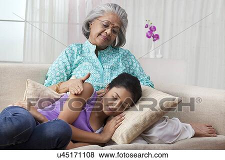 Portrait of a grandmother and granddaughter View Large Photo Image Stock Photo - Portrait of a grandmother and granddaughter. Fotosearch