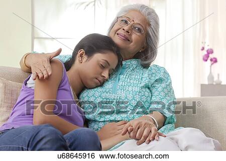 Portrait of a grandmother and granddaughter View Large Photo Image Stock Photograph - Portrait of a grandmother and granddaughter. Fotosearch