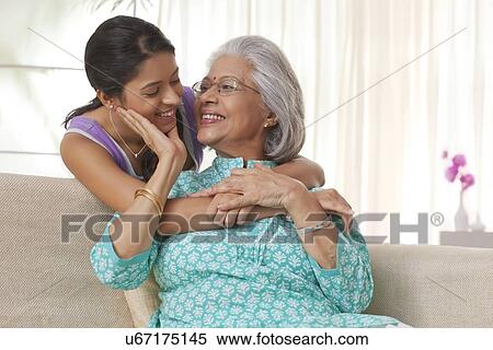 Stock Photography - Portrait of a grandmother and granddaughter. Fotosearch