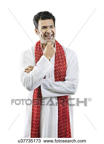 Stock Image - Portrait of a Gujarati man smiling . Fotosearch