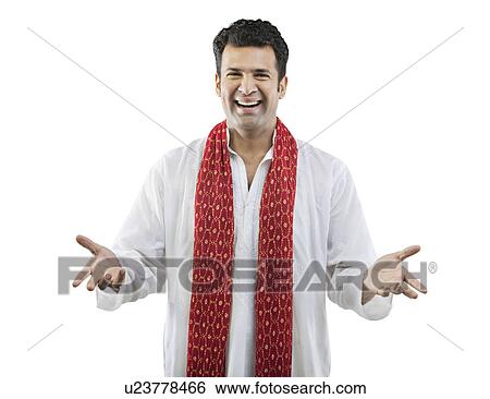 Stock Photograph - Portrait of a Gujarati man smiling . Fotosearch