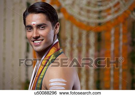 Stock Photograph - Portrait of a Hindu groom on his wedding day . Fotosearch