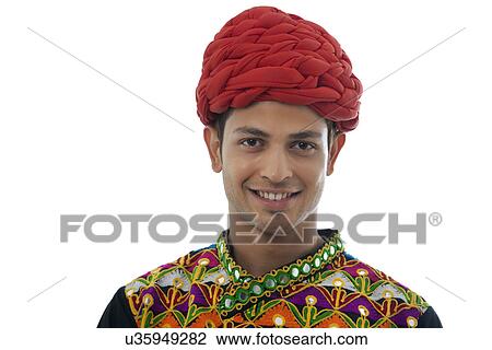 Portrait of a male dandiya dancer View Large Photo Image Stock Image - Portrait of a male dandiya dancer . Fotosearch