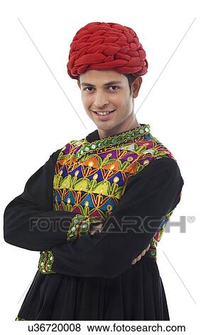 Portrait of a male dandiya dancer View Large Photo Image Stock Photo - Portrait of a male dandiya dancer . Fotosearch