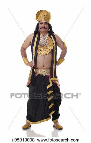 Stock Photo - Portrait of a man dressed as Raavan . Fotosearch