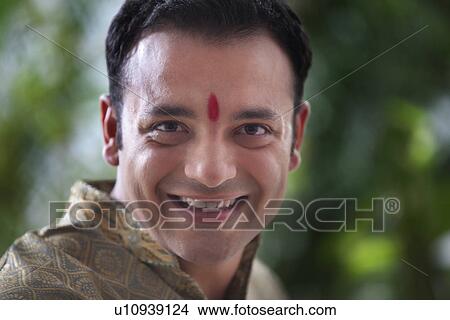 Picture - Portrait of a man smiling . Fotosearch