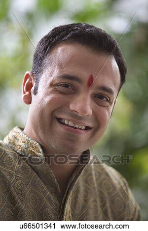 Portrait of a man smiling View Large Photo Image Stock Image - Portrait of a man smiling . Fotosearch