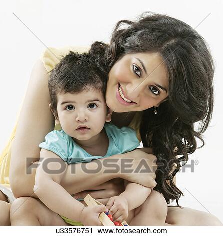 Stock Image - Portrait of a mother and her child . Fotosearch