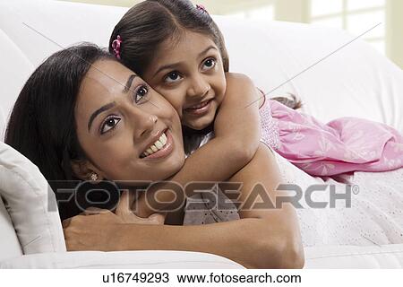 Portrait of a mother and her daughter View Large Photo Image Stock Image - Portrait of a mother and her daughter . Fotosearch
