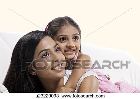 Portrait of a mother and her daughter View Large Photo Image Stock Image - Portrait of a mother and her daughter . Fotosearch