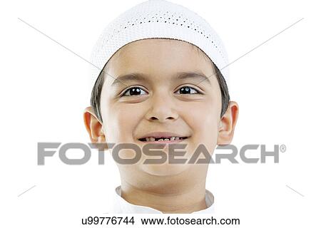 Portrait of a Muslim boy View Large Photo Image Picture - Portrait of a Muslim boy . Fotosearch