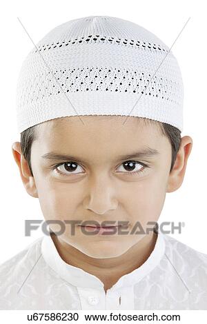 Stock Image - Portrait of a Muslim boy . Fotosearch