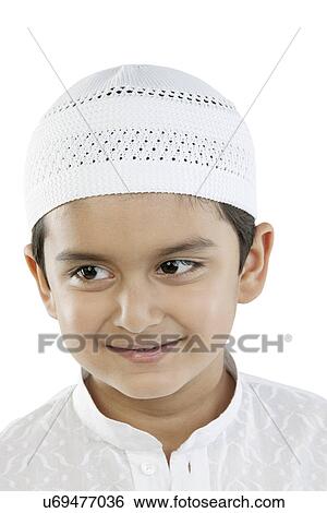 Stock Photograph - Portrait of a Muslim boy . Fotosearch