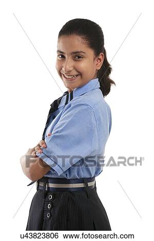 Portrait of a school girl smiling View Large Photo Image Stock Photograph - Portrait of a school girl smiling . Fotosearch