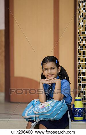 Stock Image - Portrait of a school girl . Fotosearch