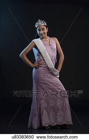 Stock Image - Portrait of a teenage beauty queen posing . Fotosearch