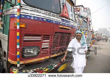 Portrait of a truck driver View Large Photo Image Stock Image - Portrait of a truck driver . Fotosearch
