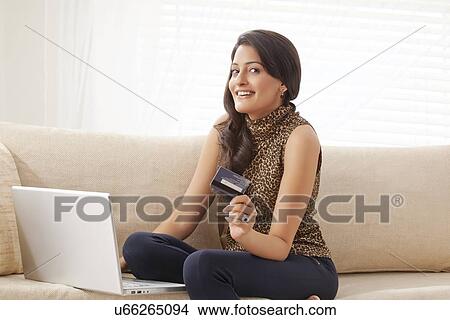 Picture - Portrait of a woman net banking. Fotosearch