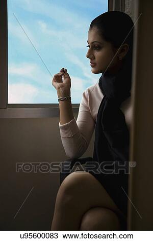 Stock Image - Portrait of a woman . Fotosearch