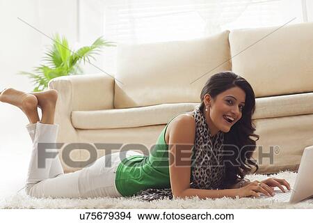 Portrait of a woman with a laptop View Large Photo Image Picture - Portrait of a woman with a laptop. Fotosearch