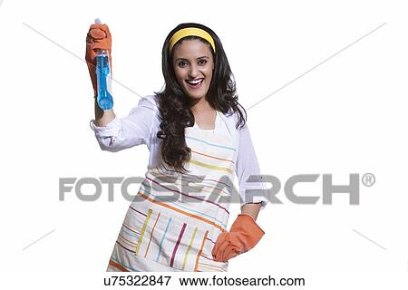 Portrait of a woman with cleaning liquid View Large Photo Image Stock Photo - Portrait of a woman with cleaning liquid. Fotosearch