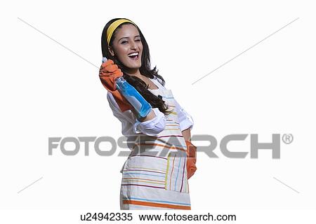 Portrait of a woman with cleaning liquid View Large Photo Image Stock Photography - Portrait of a woman with cleaning liquid. Fotosearch