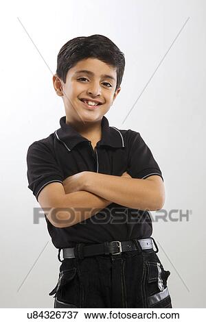 Portrait of a young boy View Large Photo Image Stock Photo - Portrait of a young boy . Fotosearch