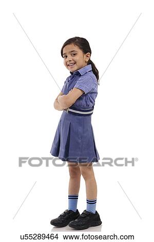 Portrait of a young school girl smiling View Large Photo Image Picture - Portrait of a young school girl smiling . Fotosearch
