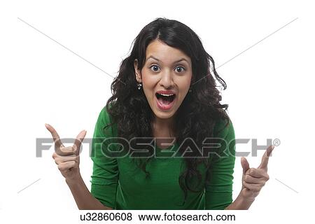 Portrait of a young woman cheering View Large Photo Image Stock Photo - Portrait of a young woman cheering . Fotosearch