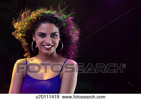 Stock Photo - Portrait of a young woman . Fotosearch