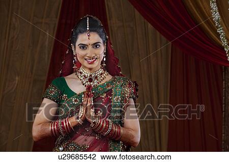 Portrait of an attractive bride greeting View Large Photo Image Stock Image - Portrait of an attractive bride greeting . Fotosearch