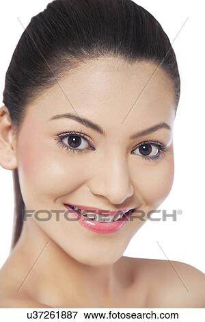 Portrait of an attractive young woman View Large Photo Image Stock Photo - Portrait of an attractive young woman . Fotosearch