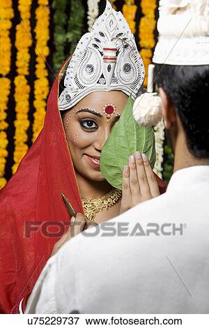 Portrait of an Indian bride and groom View Large Photo Image Stock Photo - Portrait of an Indian bride and groom . Fotosearch
