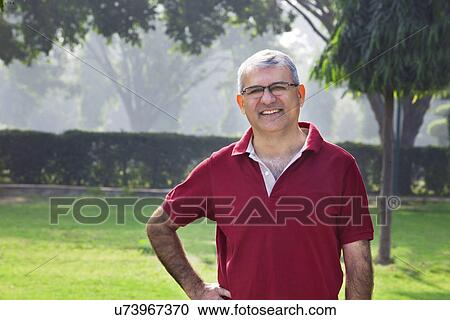 Stock Image - Portrait of an old man smiling . Fotosearch