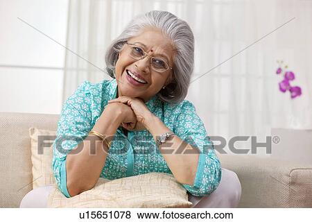 Stock Photo - Portrait of an old woman. Fotosearch